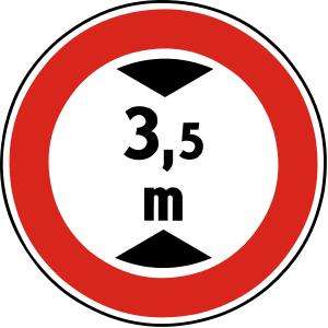 Značka B 24 - Zákaz vjazdu vozidiel, ktorých výška presahuje vyznačenú hranicu - zakazuje vjazd vozidlám, ktorých skutočná výška presahuje vyznačenú hranicu, pričom rozhodujúca je okamžitá výška vozidla vrátane nákladu.