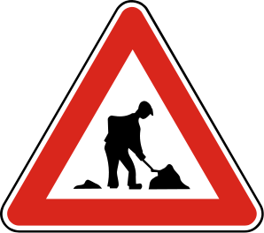 Značka A 19 - Práca - upozorňuje na prácu na ceste, prípadne na jej súčastiach, ktorá by mohla ohroziť bezpečnosť cestnej premávky alebo pri ktorej by mohli byť ohrození pracovníci, ktorí túto činnosť vykonávajú.