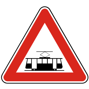 Značka A 22 - Električka - upozorňuje, ak je to potrebné v záujme bezpečnosti cestnej premávky, na miesto, kde električka križuje smer jazdy ostatných vozidiel.