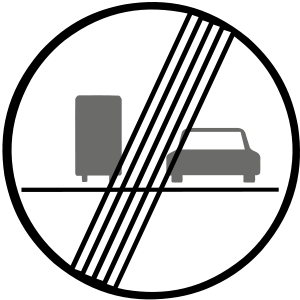 Značka B 30b - Koniec zákazu predchádzania pre nákladné automobily - končí platnosť obmedzenia vyznačeného značkou B30a, ak nie je skôr skončené inak.